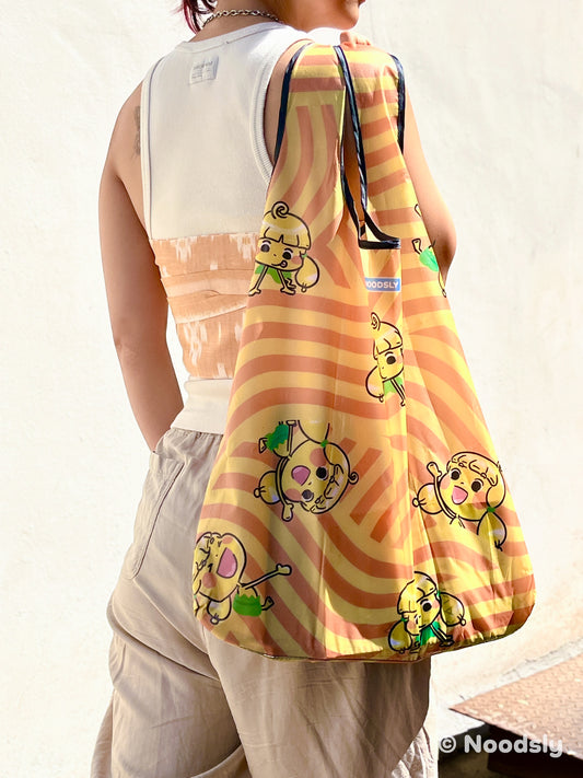 10) Noodsly Swirvy Orange Waterproof Foldable Bag