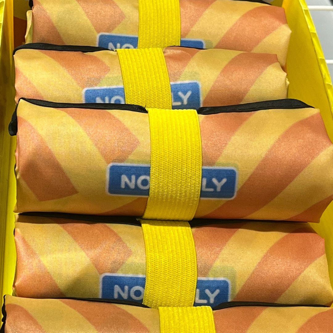 07) Noodsly Swirvy Orange Waterproof Foldable Bag